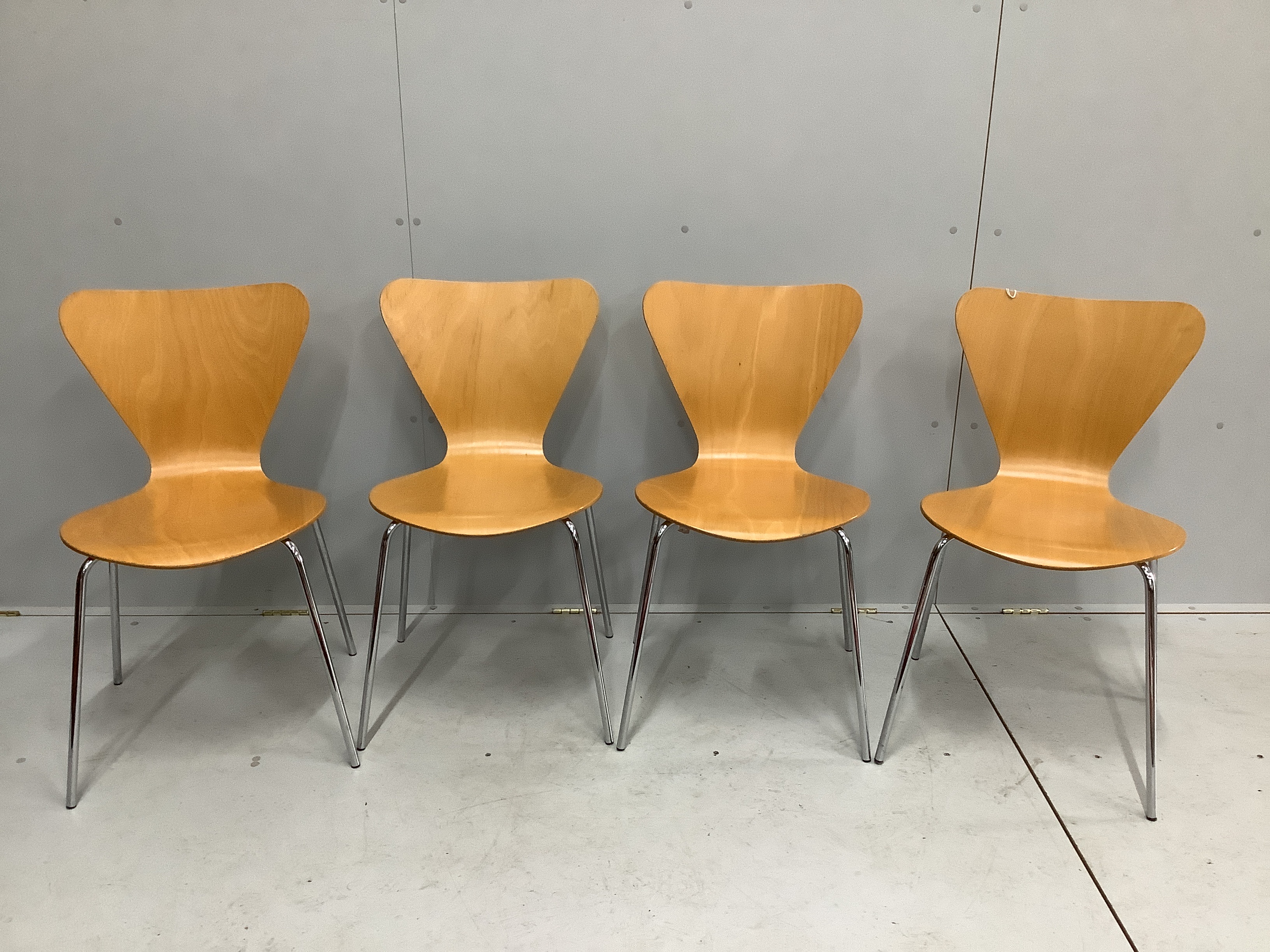 A set of four Arne Jacobsen style bent ply and chrome chairs, width 45cm, depth 40cm, height 80cm